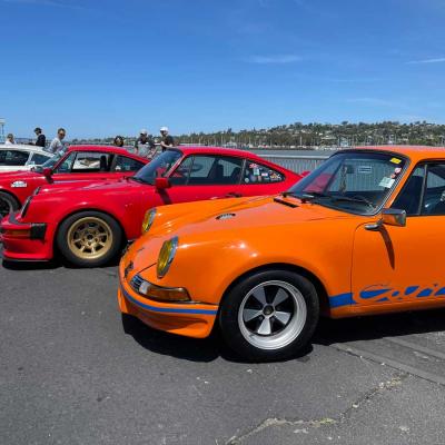 Beautiful row of cars by the water at Luft 9