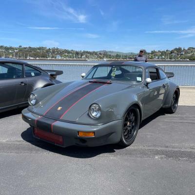 Grey and black porsche at Luft 9